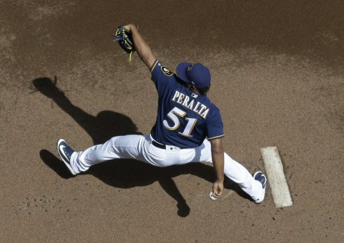 Brewers-Freddy-Peralta-above-AP